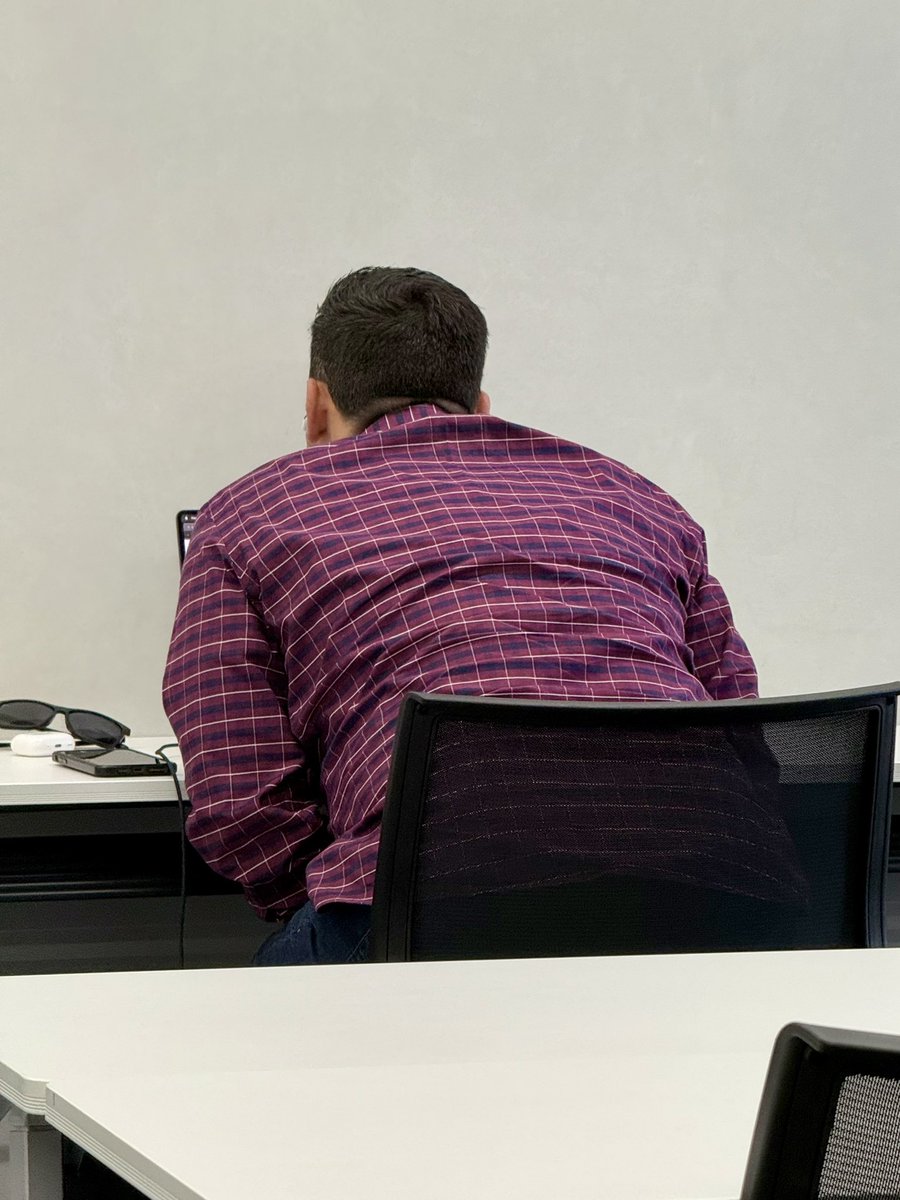 andrewculver's tweet image. In the green room in Japan with a colleague before an event starts and he's on a call with his young kids back home. He's been over there hugging and kissing the camera for 10 minutes. Peak fatherhood. ❤️