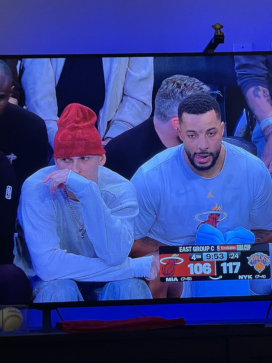 concertstephen's tweet image. what the hell is tyler joseph doing on the miami heat bench