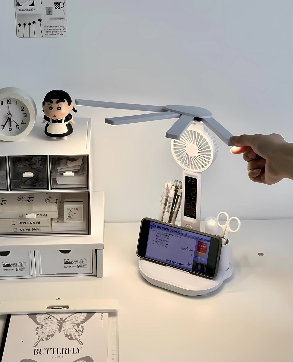 haivcy's tweet image. just found the most useful, multifunction desk lamp ever

this lamp has a fan, a clock, a pen holder and a phone stand