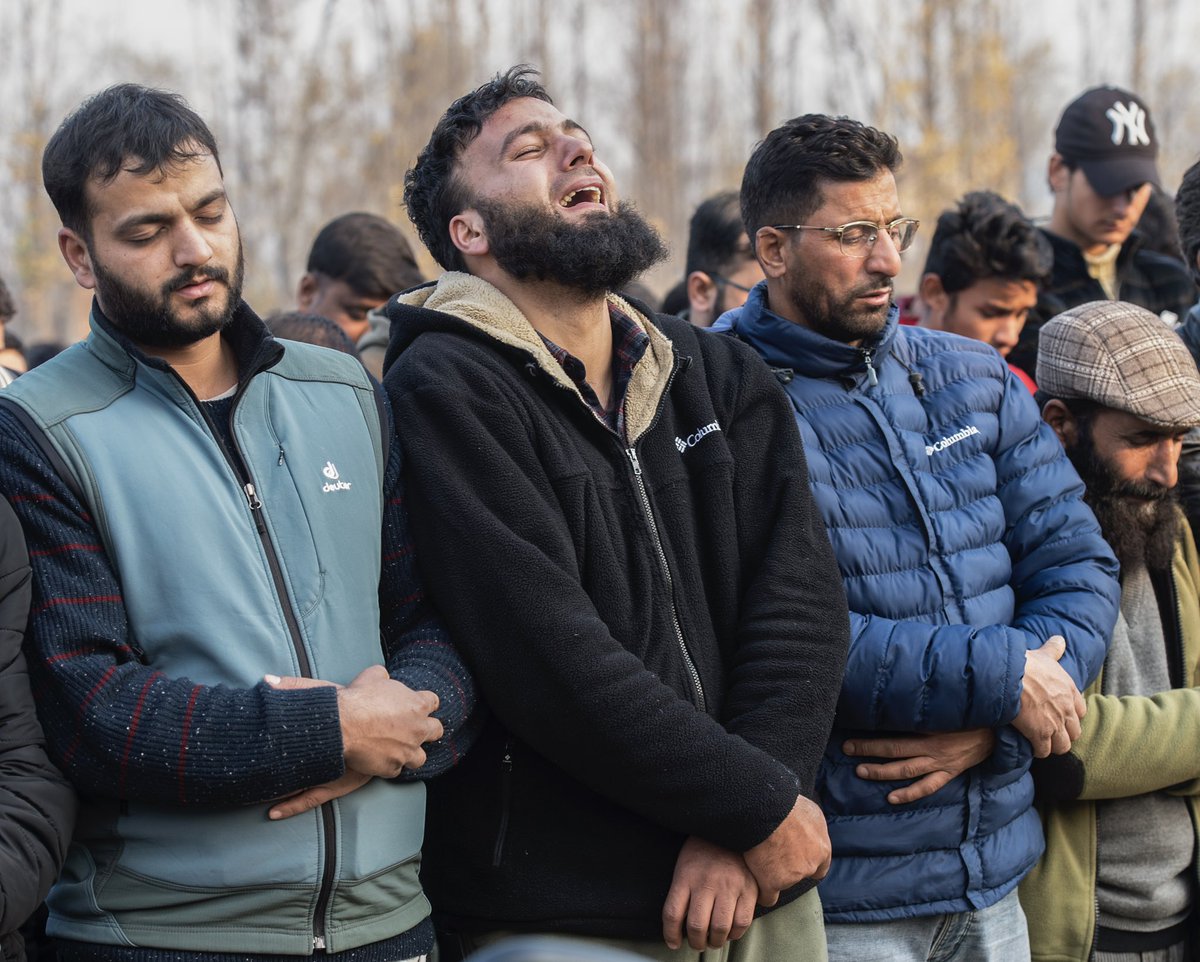 People offer funeral prayer of Mohammed Shafi (a tailor), who was killed in an explosion inside a police station in Nowgam Srinagar.

Photo <a href="/javeddar786/">Javed Dar</a>