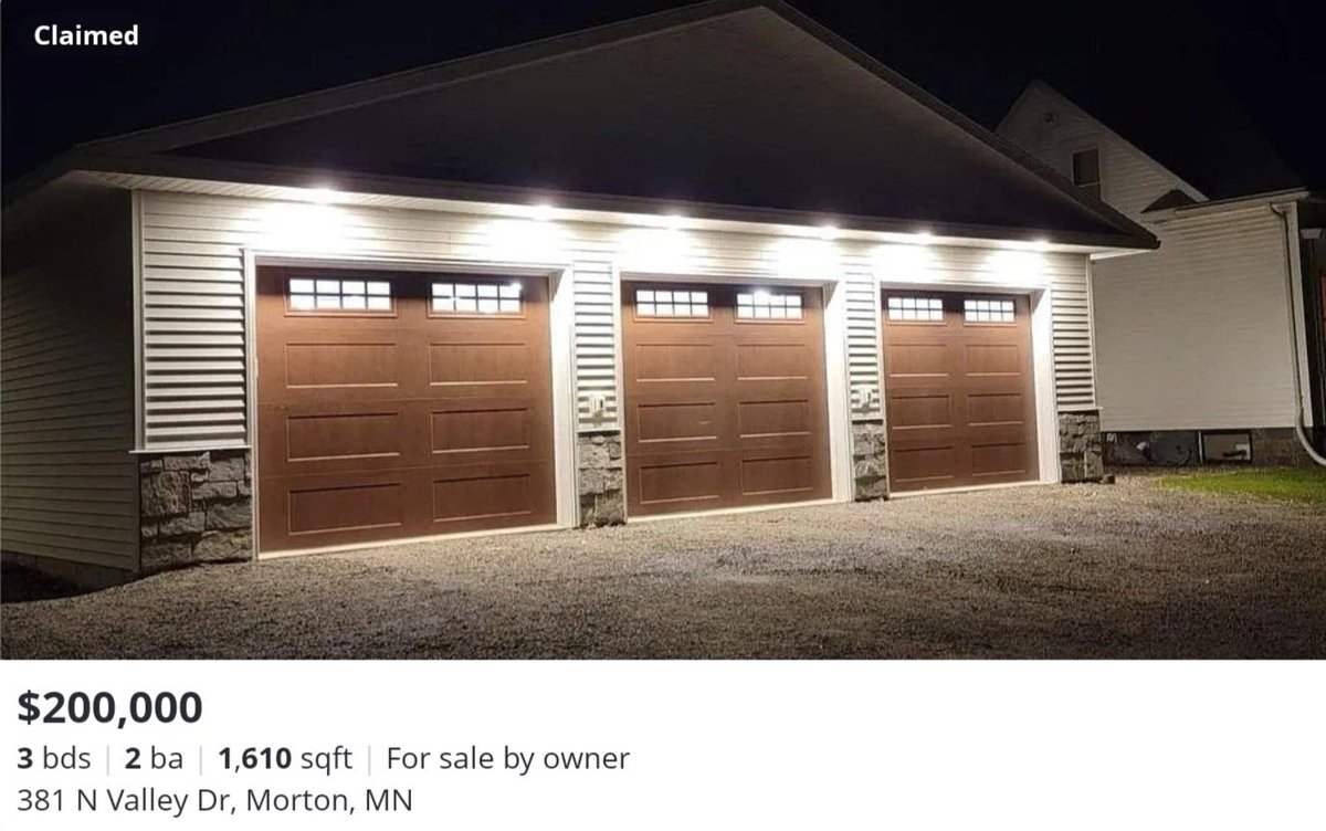 You can get a 3 bedroom home with a six car attached garage in the midwest for $200k .