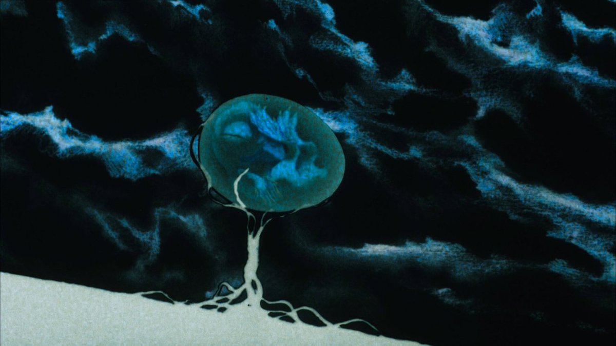 The cathedral of dreams sinks into industrial ruin in the dreamy city of Angel’s Egg.