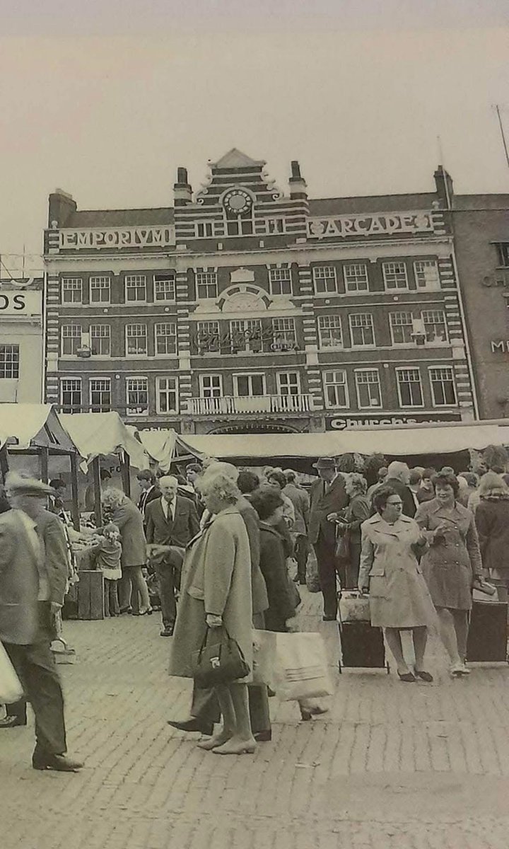 Northampton Market Square with the much missed, Emporium Arcade in the background.