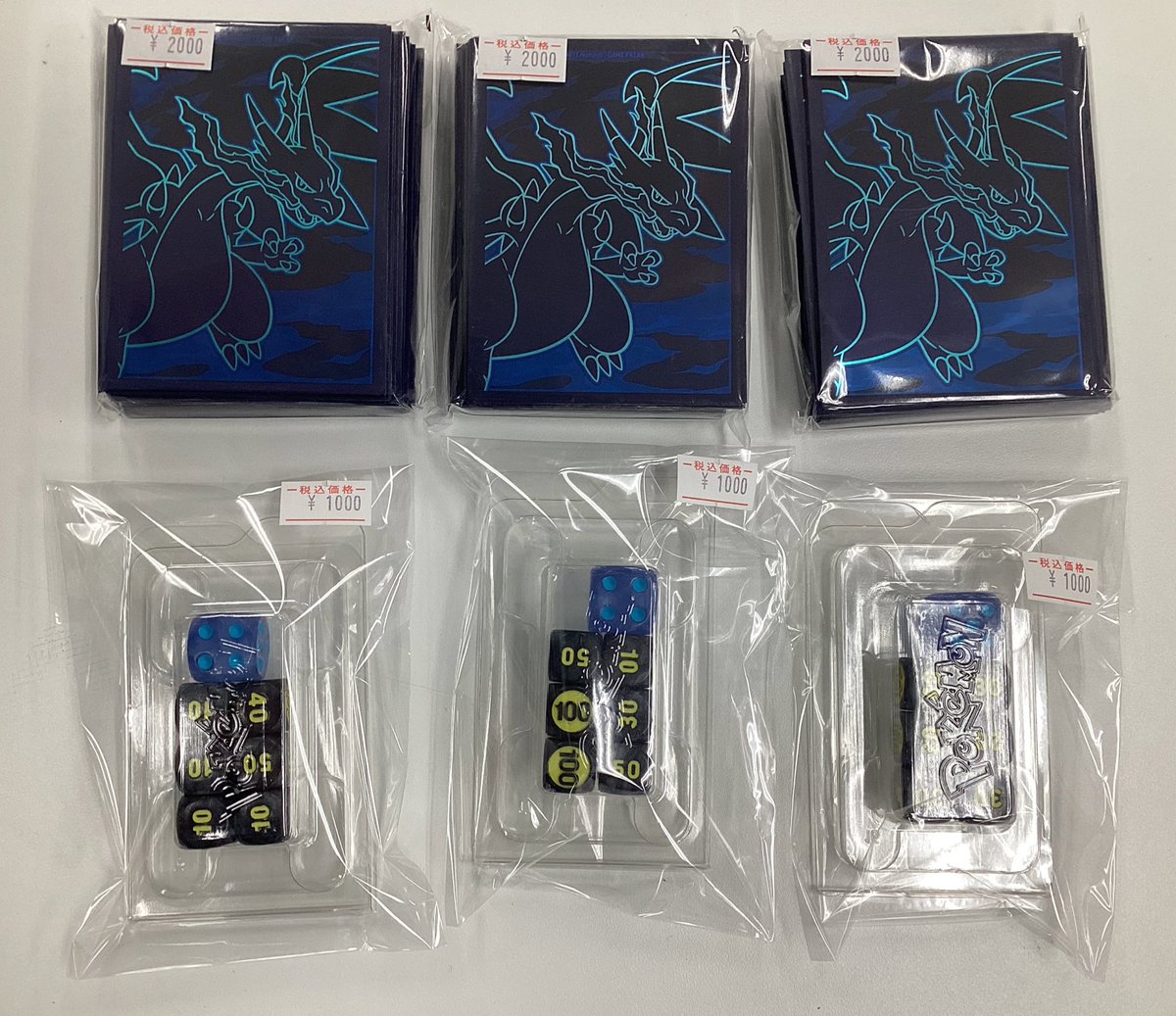 商品情報】 メガリザードンXのスリーブとダメカンダイスが入荷しました