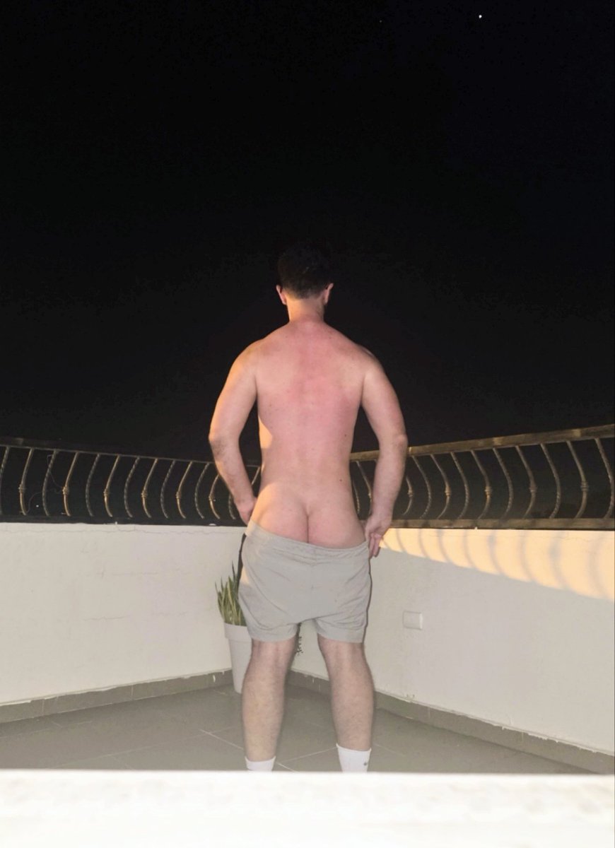 Date night just started on the penthouse balcony.
I’m staring at the North Star…
you’re staring at the view in front of you.
Still sweaty from the gym, shorts pulled low, cheeks glistening under the night sky.
Go ahead and leak for me.
Every notification makes my phone buzz