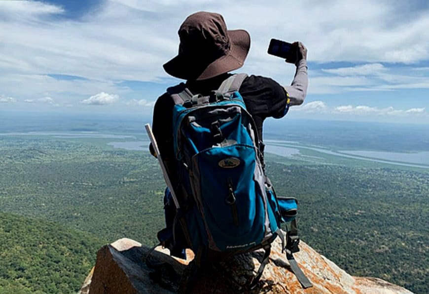 WasswaEmma_'s tweet photo. Facts about Uganda's Table Mountain 📍
In today’s Visit West Nile campaign, we journey to one of Moyo’s greatest treasures, #Otce Mountain. Just 30km from Arra. The 1,563m giant isn’t just a hike. It’s an adventure wrapped in culture, nature and pure adrenaline.
Crossing the mighty Albert Nile by boat or public ferry. Through Moyo’s rolling landscapes until the trail finally appears
Otce’s climb has something for everyone. A gentle beginner trail for first-timers and tougher routes for the brave hearts.
Along the way, you will hear bird sounds, see unique trees, escarpments whispering ancient stories, and three rest stops perfect for photos you’ll never delete.
And as always in West Nile, culture leads the way. A bush breakfast with seasonal wild fruit, community entertainment, and stories that remind you Otce isn’t just a mountain, but heritage.
At the summit, everything goes quiet. Panoramic views that feel almost unreal, storytelling about the mighty chimpanzees that once lived here, and the hope that tourism will help bring them back.
#VisitWestNile