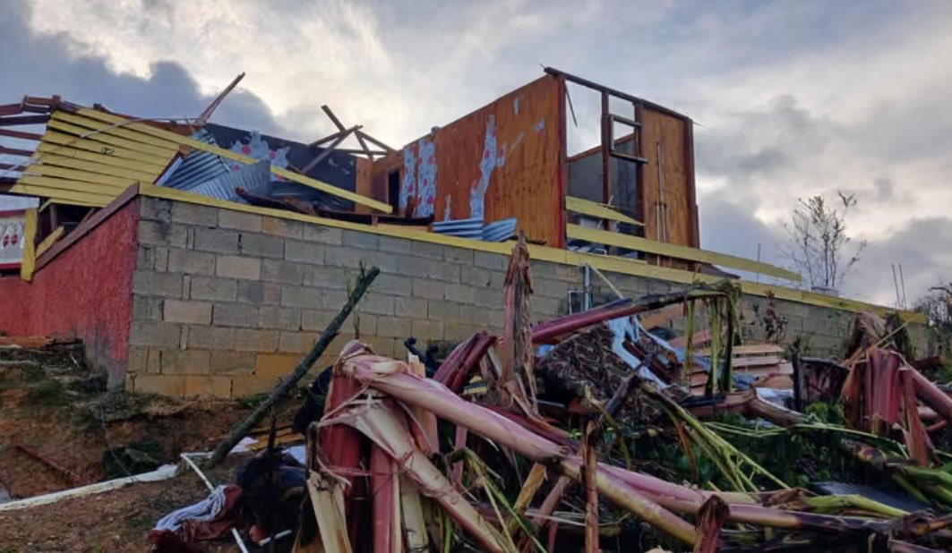 melissasigodo's tweet image. 8yo Lati-Yana’s grandma is now physically unable to look after her but the Home Office says that ‘other relatives can take care of her’ rather than letting her come be with her mum in the UK

This is their home which was destroyed by Hurricane Melissa leaving the girl destitute