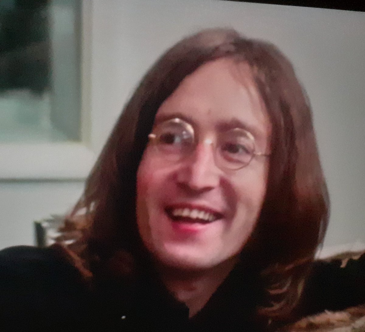 "paul, george, myself, old footage of john, of course"