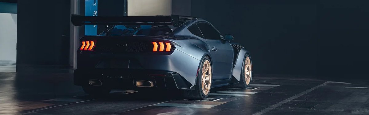 Taehyung is driving a Ford Mustang 2025 GTD