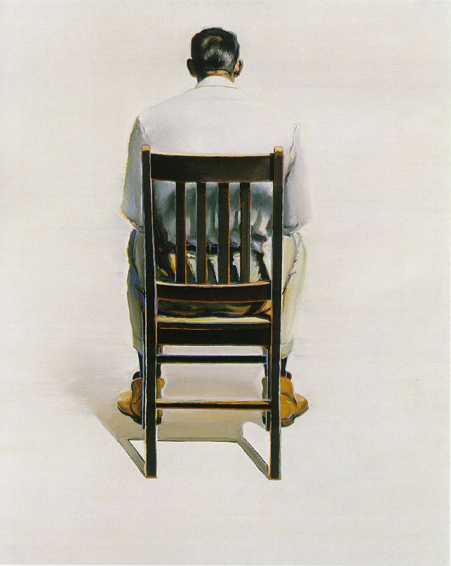 Man Sitting - Back View