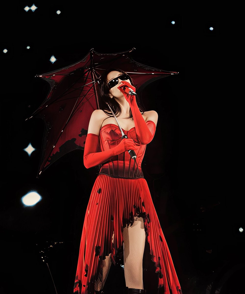 Uitedi's tweet image. the best fit of the whole tour and yes that includes every past and future fits the other members could ever wear its too insane for bp tour it looks like flames are dropping through the umbrella making burnt holes to the dress and turning the corset into different shades of red