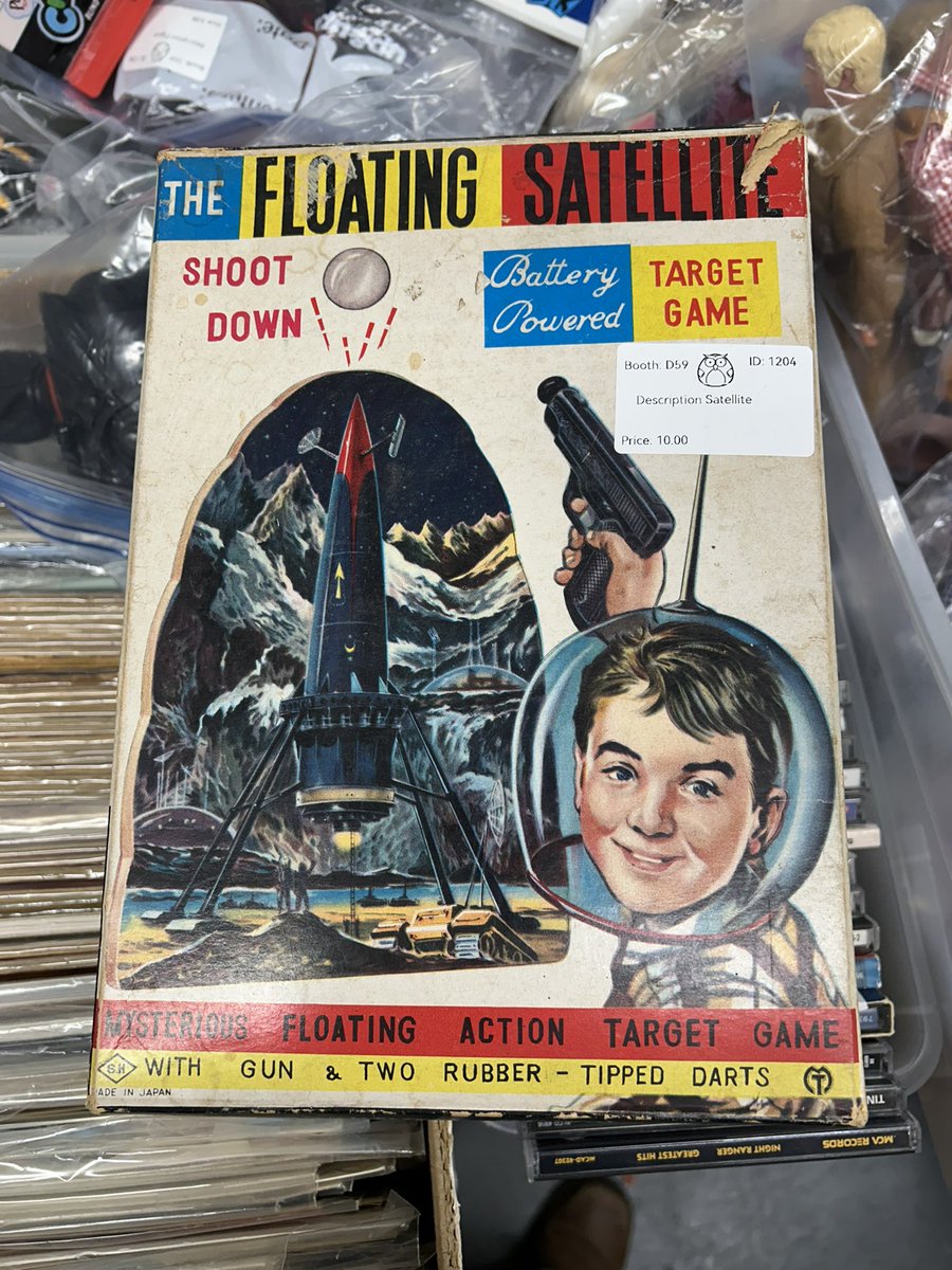 hankbukowsi's tweet image. Spotted at the antiques mall: awesome #sciencefiction graphics on this #vintage skeet shooting #toy , The Floating Satellite.  Check out those domed installations and the tracked vehicle with a towering radar dish.