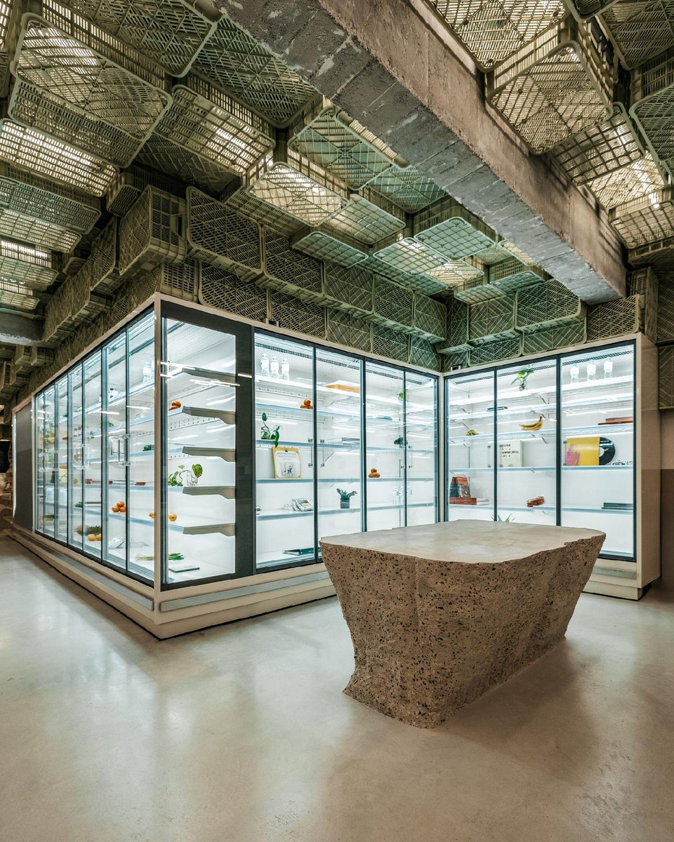 dezeen's tweet image. Plastic Box store is &quot;a brutalist art gallery disguised as a supermarket&quot;: dezeen.com/2025/11/28/pla…