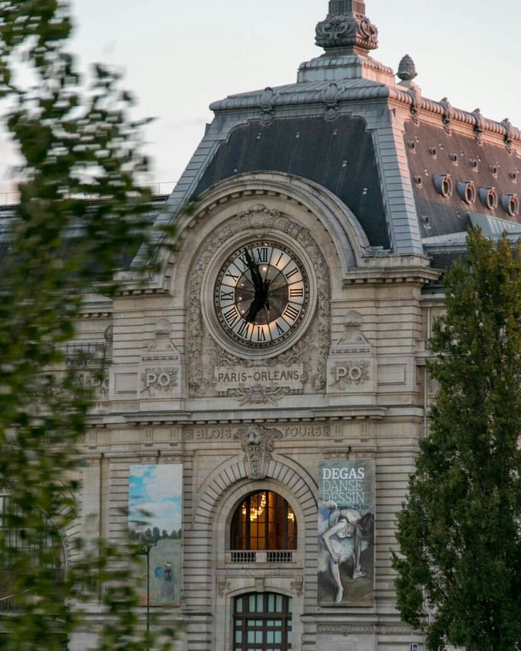 The grand facade and iconic clock of the Musée d'Orsay in Paris.
