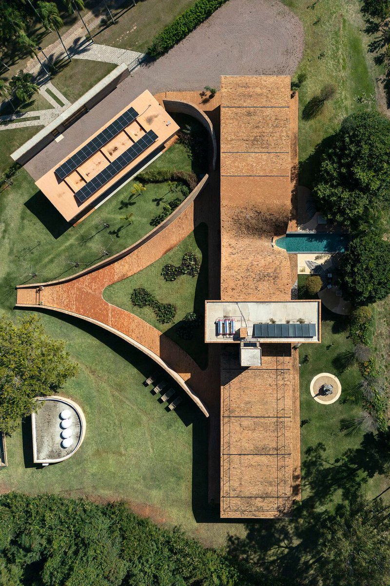 Archello's tweet image. Mareines Arquitetura crafts a Passive House that rises from the landscape, shaped by reforested terrain, curved exposed-brick roofing, and passive cooling strategies.
archello.com/project/passiv… 

#MaterialEcology #PassiveDesign #ContemporaryArchitecture