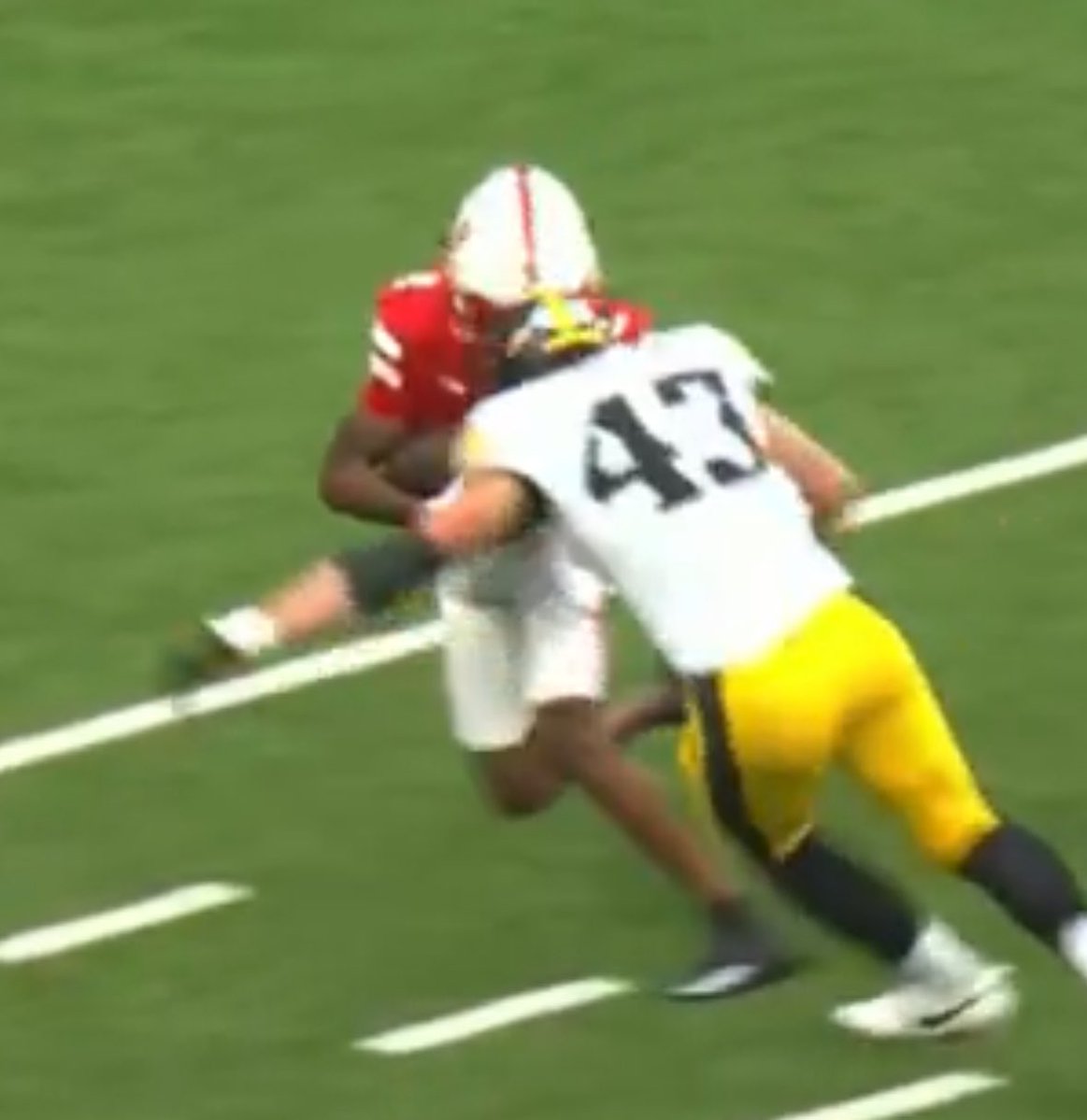 The targeting rule needs to go.

This seems like the picture-perfect definition of what most people believe targeting to be, but it wasn’t called even after review.

The top of his helmet went entirely into the facemask of the Nebraska player.

If this isn’t targeting, what is?