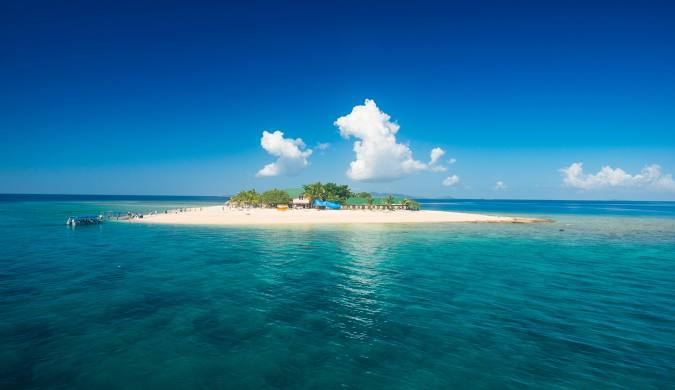 The Mamanuca Islands of Fiji are a volcanic archipelago lying to the west of Nadi and to the south of the Yasawa Islands. The group, a popular tourist destination, consists of about 20 islands, but about seven of these are covered by the Pacific Ocean at high tide.