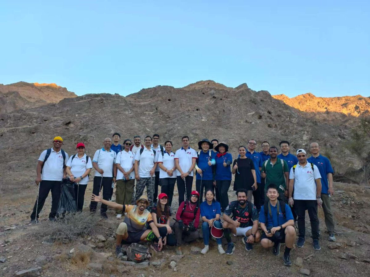 ChinaEmbOman's tweet photo. Today, we joined the Embassy of Nepal and friends in a joyful celebration of Oman's Glorious National Day! In a joyful, family-like atmosphere, Ambassador Lyu Jian and Mme. Tina joined Ambassador Dornath Aryal and Mme. Swodesh, alongside colleagues and friends, for a meaningful hike along the C38 trail. We combined the appreciation of stunning coastal views with a collective effort to clean the path, contributing to environmental protection.

The activity left everyone feeling refreshed and happy. As evening fell, the view of the castle—adorned with special National Day lights against the sea—was truly memorable. A special thanks to our professional guides, Abudullah and Fathiya, for their outstanding support!

Happy Glorious National Day! Longlive friendship! @NepalinOman