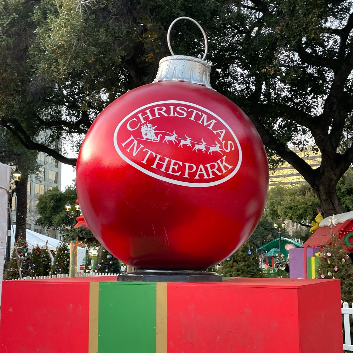 The aroma of chocolate drifts through the air as festive lights