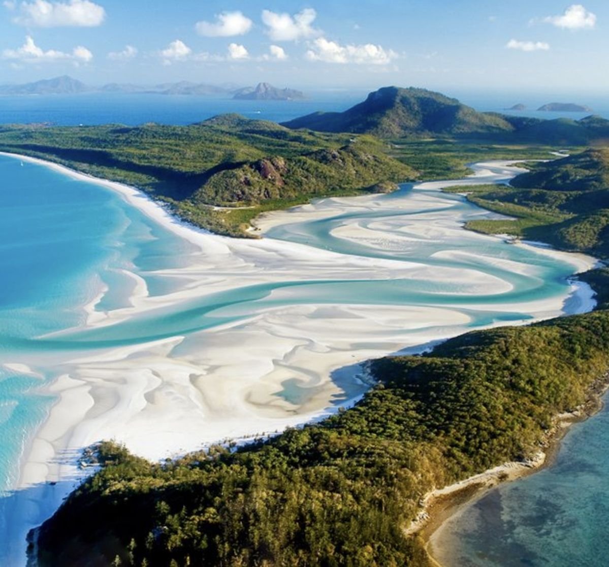 Australia.
Hill Inlet and Whitehaven Beach, Whitsunday Island.
Hill Inlet is a stunning inlet at the northern end of Whitehaven Beach on Whitsunday Island, famous for its swirling white sand and turquoise waters.