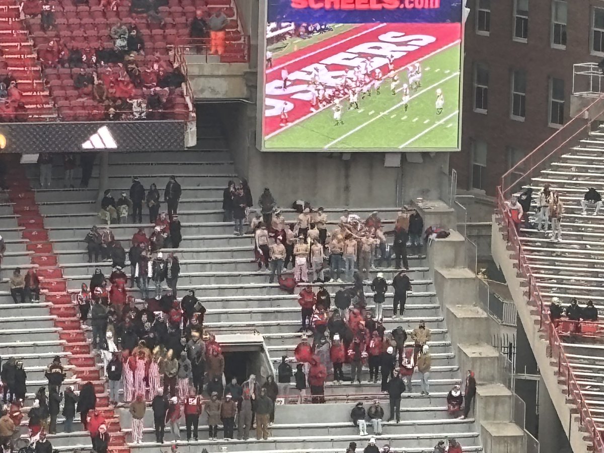 Desperate times call for desperate measures. Tarps are off in what’s left of the east student section as the #Huskers  lose a fumble in the red zone.