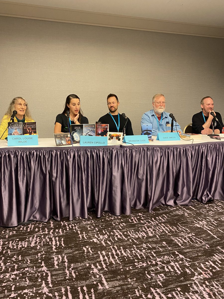 Telling Your Story, the second panel I’m attending at Loscon 51 at the LAX Hilton. This one’s about how much your writing should draw from real life experience. Check out the name tags for author names.