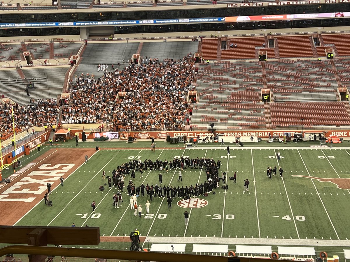ChipBrown247's tweet image. #TAMU Aggies gather in a circle to chants of “Overrated!” from the #Texas #Longhorns’ student section. Kickoff at 6:30 pm CT (on ABC). Follow along at Horns247.com.