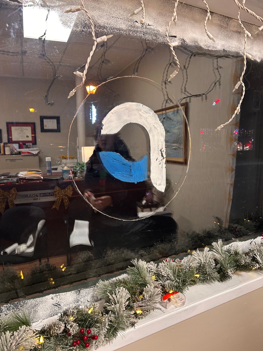 PurvisCulbert's tweet image. We had a fun time decorating our offices today for the holidays! We even worked a temporary window logo into our design. Chester approves! #teamwork 
# holidaydecor #lawoffice