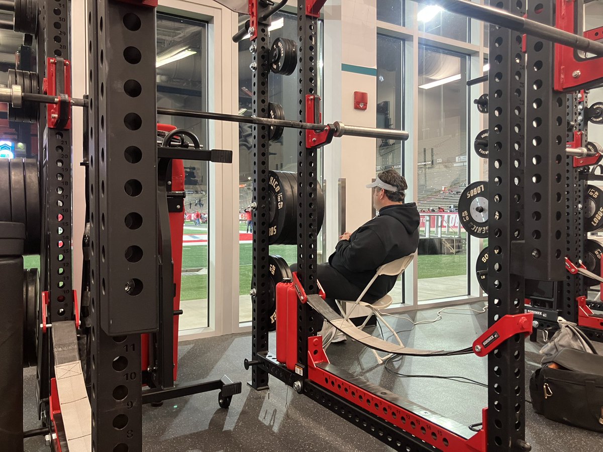 Jason Eck is watching the end of this Boise State-Utah State game alone in UNM’s weight room