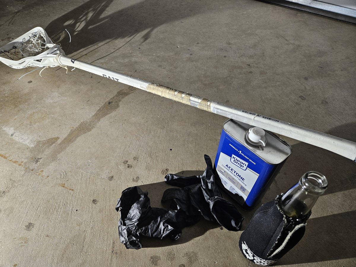 Sitting in the garage, drinking beer, working on daughters lax twig.