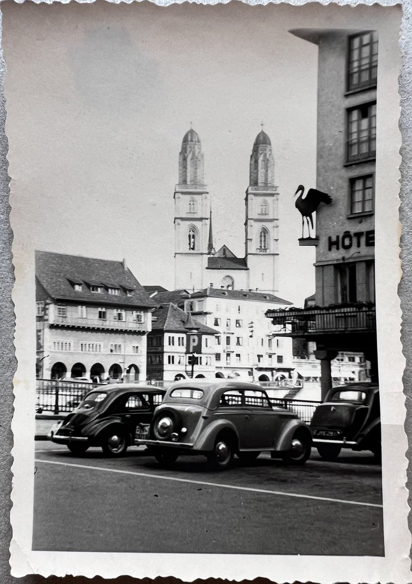 VoxScorpio's tweet photo. Zurich, Switzerland, mid-1940s. On the right is Haus zum Storchen, a hotel that still exists, and across the Limmat River Zurich’s landmark Grossmünster church. (Photo taken by my father.) https://t.co/2533bOcLaG
