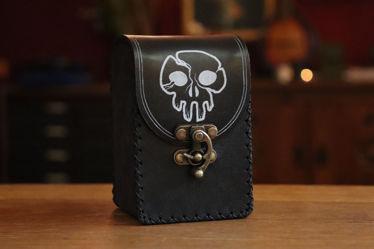 SpeechlessBard's tweet photo. If you're going for an all black mana Commander Deck, then going for all black leather for the fitted pouch is a no brainer 🖤 
Our own versions of the mana logos do show up better with a white inlay, sorry!
#mtg #commanderdeck https://t.co/xnhprnzlQf