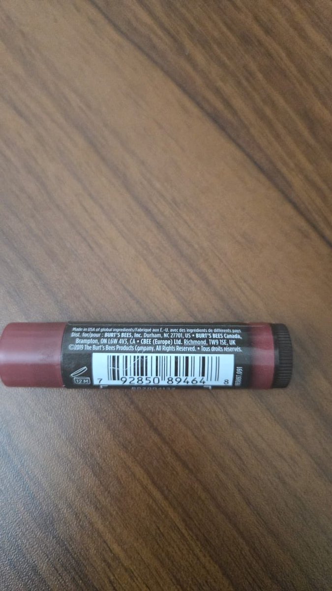 b_cinemas's tweet photo. @BurtsBees I received a Tinted Lip Balm (Red Dahlia) and it arrived with a hole/defect in the product. It also has a strong, rotten oil–like smell, which is unusual.  

Order ID: NAEHB0036336136  
Please check this batch and advise on a replacement.  
Photos attached. https://t.co/jgORuIy7on