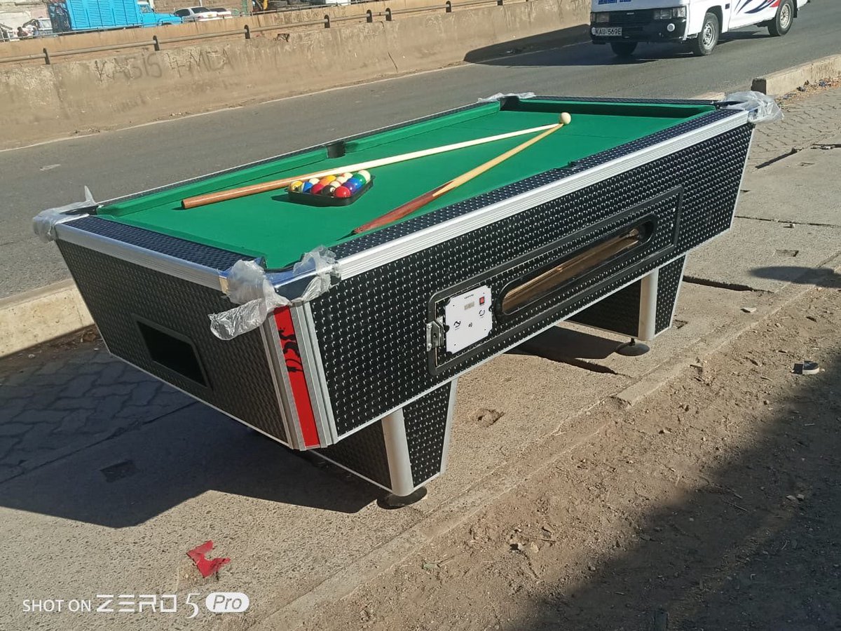 VkBoit's tweet photo. We get a lot of enquiries about use cases of QuePay some of which we hadn’t thought about or that we are still working on. Someone ordered some to be used on some medical device another for a paid public restroom etc etc

But popular among them was for pool tables, this is an area very many small business owners lose a lot of revenue and the inconveniences of looking for 20 shilling coins or lost tokens. 

From our experience on the first versions of QuePay for milk and water ATMs, with hardware, you can’t ship first and then perfect it later. So we really needed to make sure everything works because when you have it installed in Eldoret and you are in Nairobi, you can’t afford to have it breakdown and have to send out someone every time. 

Additionally, it needed to be very easy to retrofit since a lot of people already own the tables plus installation needed to be easy so that anybody can do it. 

Data from Kenice and other local manufacturers puts the number of pool tables in Kenya at over 30,000. This is largely not automated at the moment and we are looking to solve that problem. 

So as we finalize the assembly and testing of the first batch kindly do a pre-order and also share with someone who might need this.