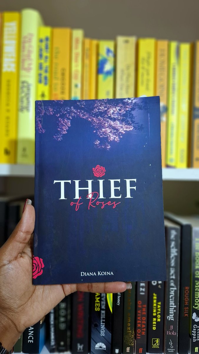 Day 29 of posting Kenyan books on the timeline: Thief of Roses by Diana Koina.

"Robberies with ominous dark signs, dark smiles on white cards...the murky waters of uncontrolled fates are working behind closed doors, in a fight for biased half-truths and halfwins."

❤️