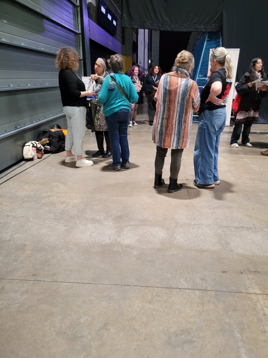 Dykeocletian's tweet photo. This is the group (though not everyone in the photo is part of it) at YP conference handing out TERF leaflets that misuse the term "materialism" to pile hatred on transgender people. @thisisyourparty why are these reactionary scumbags allowed but socialists are being barred??? https://t.co/ToIqRiVozM