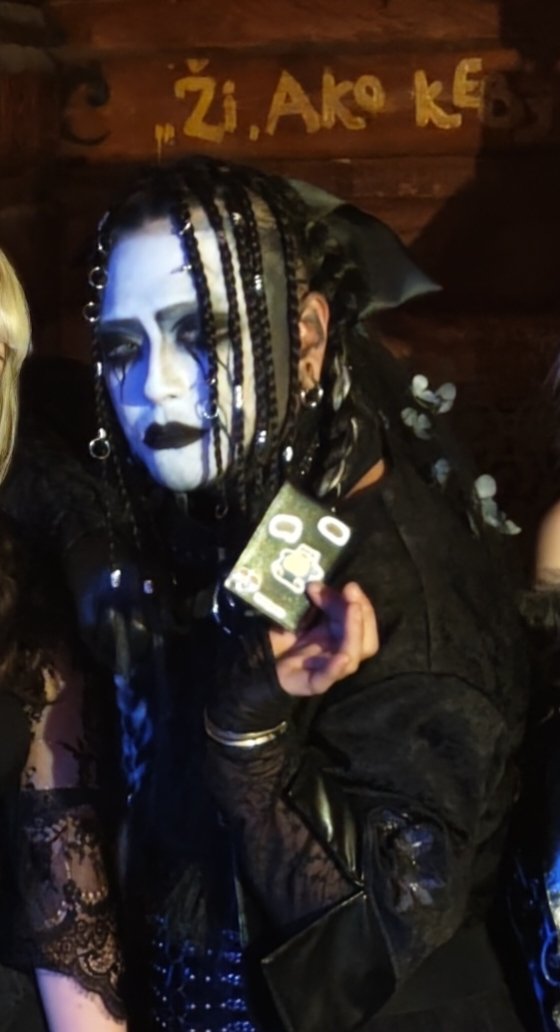 Please enjoy this picture of Hitone appreciating the back of his card more than the front because it has stickers of isopods and snorlax on it 💀♥️