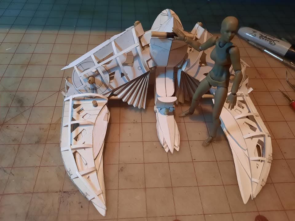 MadcapsArts's tweet image. That gold flying thing is the framing for a hydrogen balloon, Hoogvliever (Dutch for &quot;Wing Flyer&quot;) is a hydrogen-clock work balloon wing.