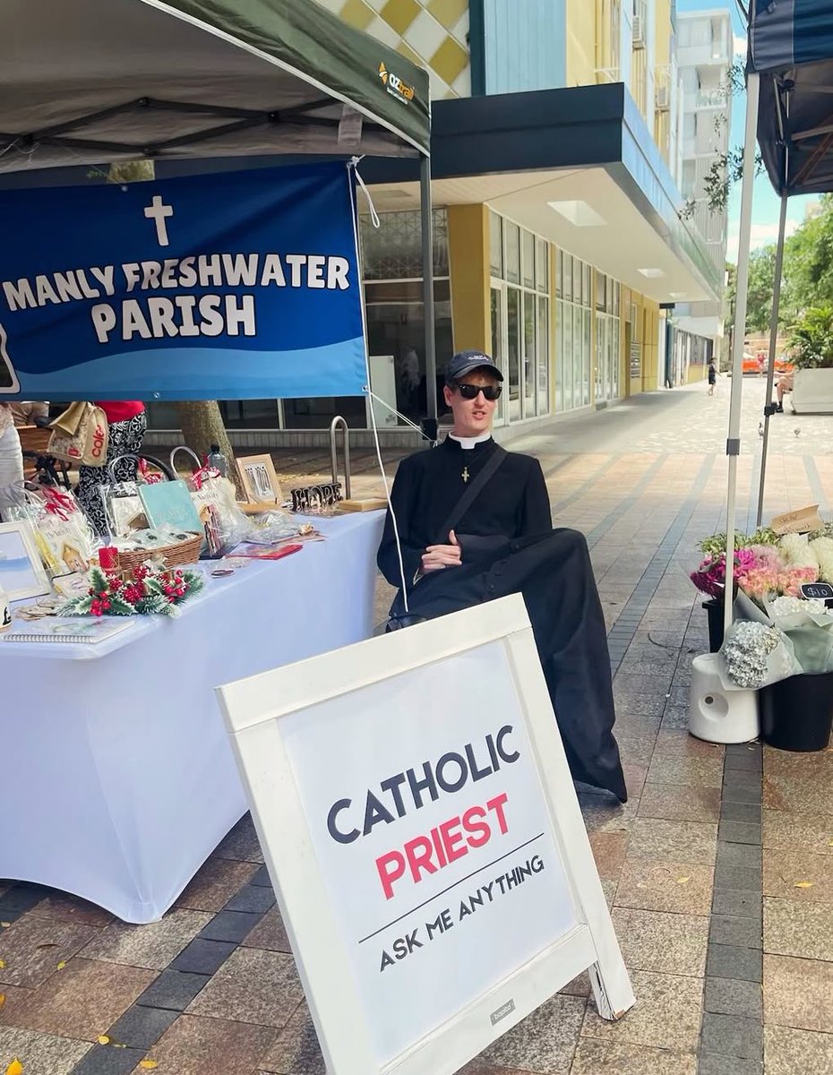 Sachinettiyil's tweet image. Catholic priest Sam French takes to the streets for evangelization, welcoming anyone who passes by to stop and ask him questions about the faith.

Image: Fr Sam French