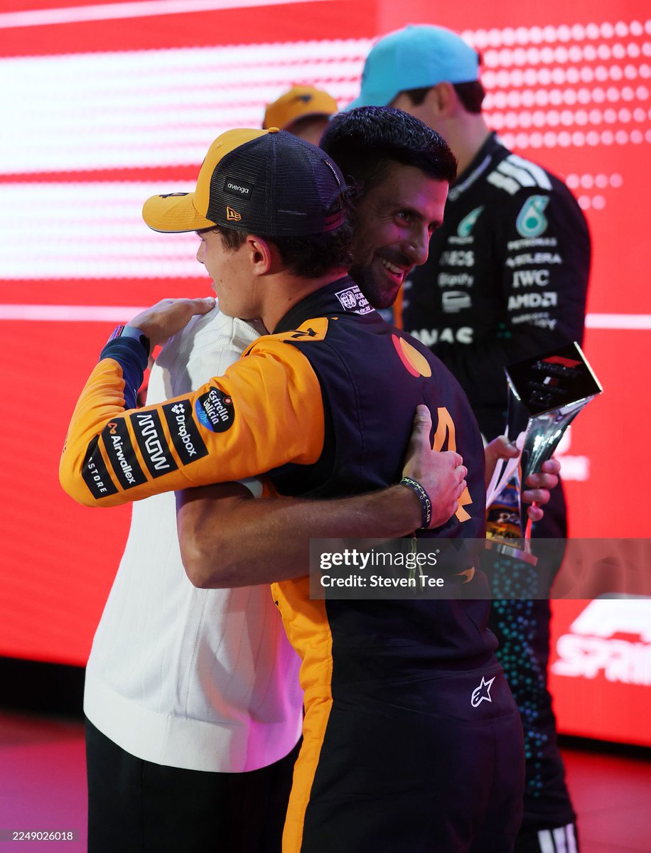 NovakFanClub's tweet photo. Novak Djokovic presents Third placed Lando Norris  and McLaren with his trophy 🏁 🏎 

 @f1  

#Qatar 

 (Photo by Steven Tee/LAT Images) https://t.co/mGN2Rwo6eQ
