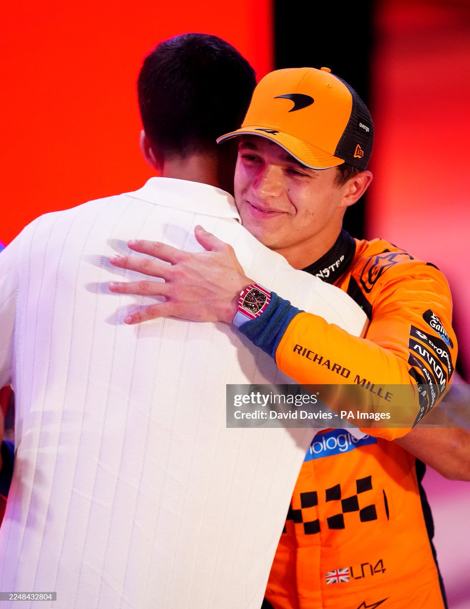 NovakFanClub's tweet photo. Novak Djokovic presents Third placed Lando Norris  and McLaren with his trophy 🏁 🏎 

 @f1  

#Qatar 

 (Photo by Steven Tee/LAT Images) https://t.co/mGN2Rwo6eQ