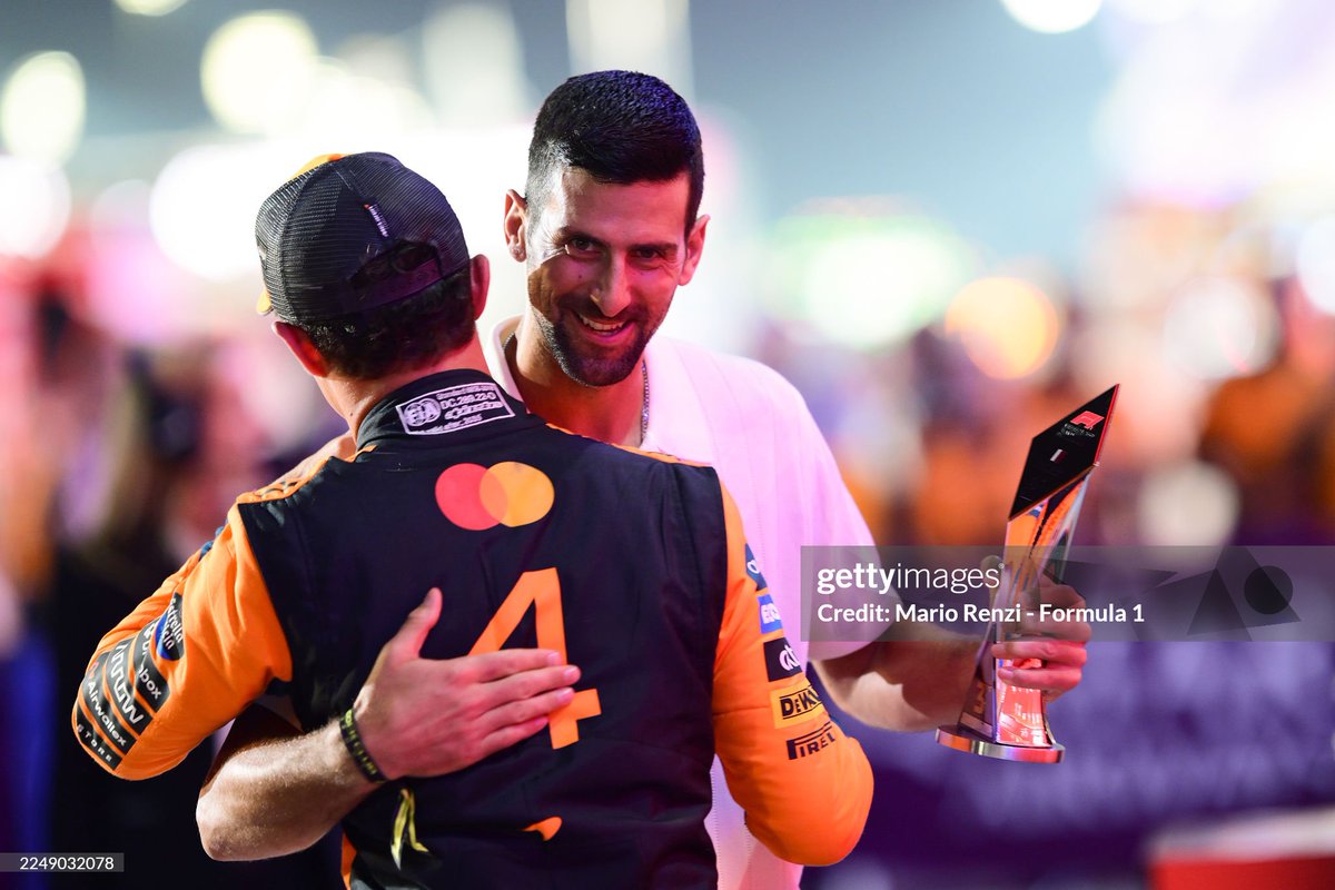 NovakFanClub's tweet photo. Novak Djokovic presents Third placed Lando Norris  and McLaren with his trophy 🏁 🏎 

 @f1  

#Qatar 

 (Photo by Steven Tee/LAT Images) https://t.co/mGN2Rwo6eQ
