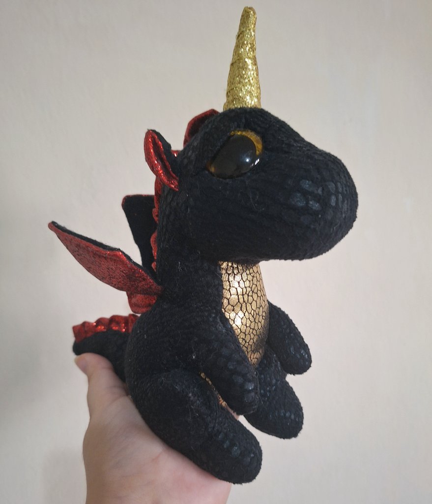kreiburgcito's tweet image. forgot to answer my own prompt Help. but theres a lot of stuff so i&apos;ll just show my most priced posession.... thrifted baby dragon hunter