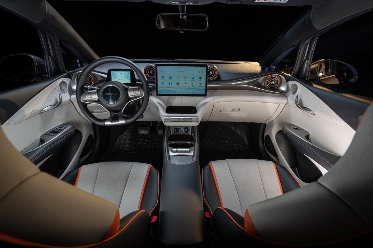 BYDCompany's tweet photo. Inside the BYD DOLPHIN, modern design meets intelligent engineering to shape a high-tech cabin that feels seamlessly connected. https://t.co/H0zaCf4haq