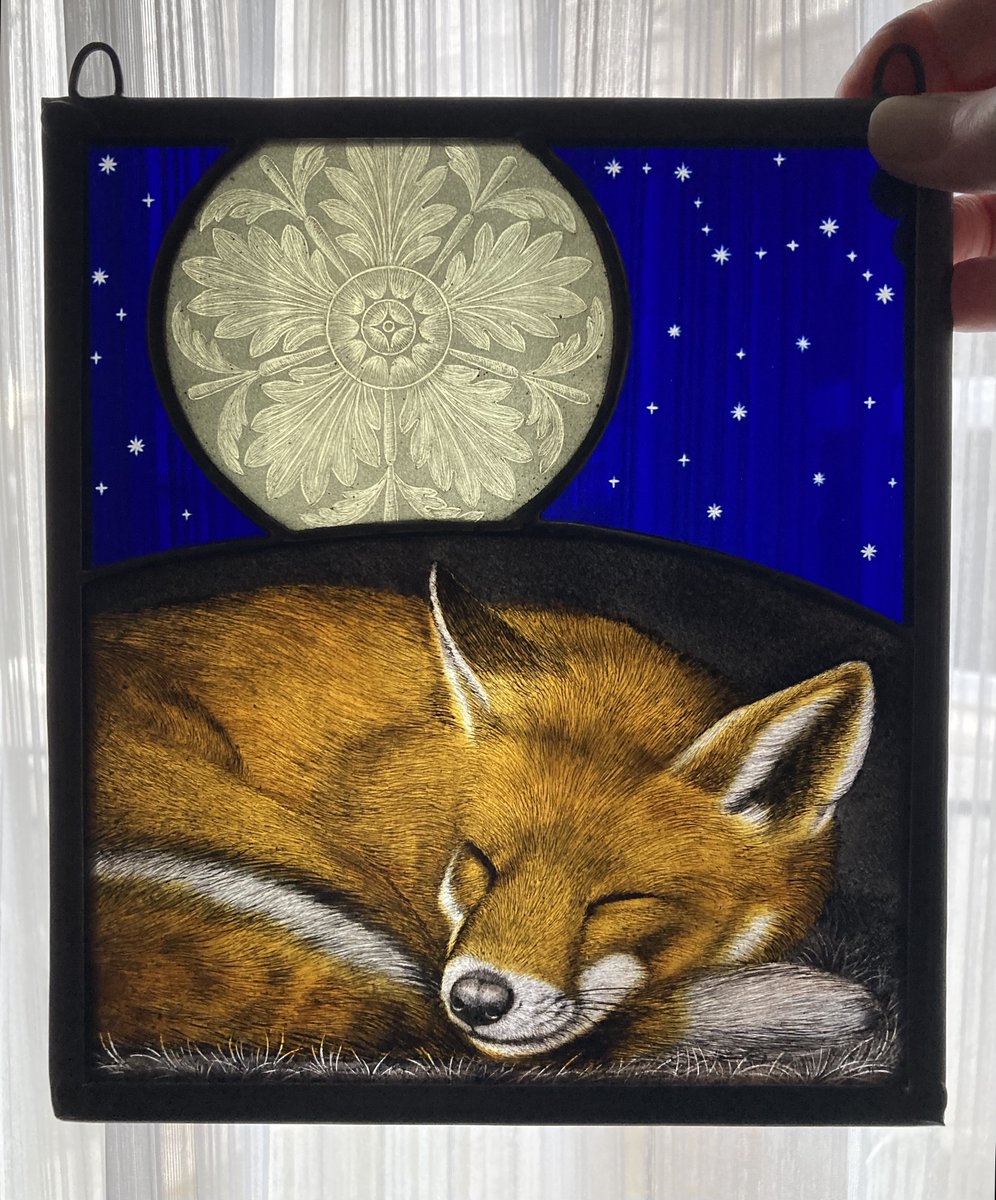 LornaSharkey1's tweet photo. New stained glass panel hand painted with a sleeping fox under a decorative moon & stars. The hand engraved nights sky features ”Vulpecula” the Little Fox constellation 🦊💙💤
#stainedglass #handpaintedglass #foxes #glassart #etsy #moonandstars #goodnight https://t.co/LVbrATbY4D