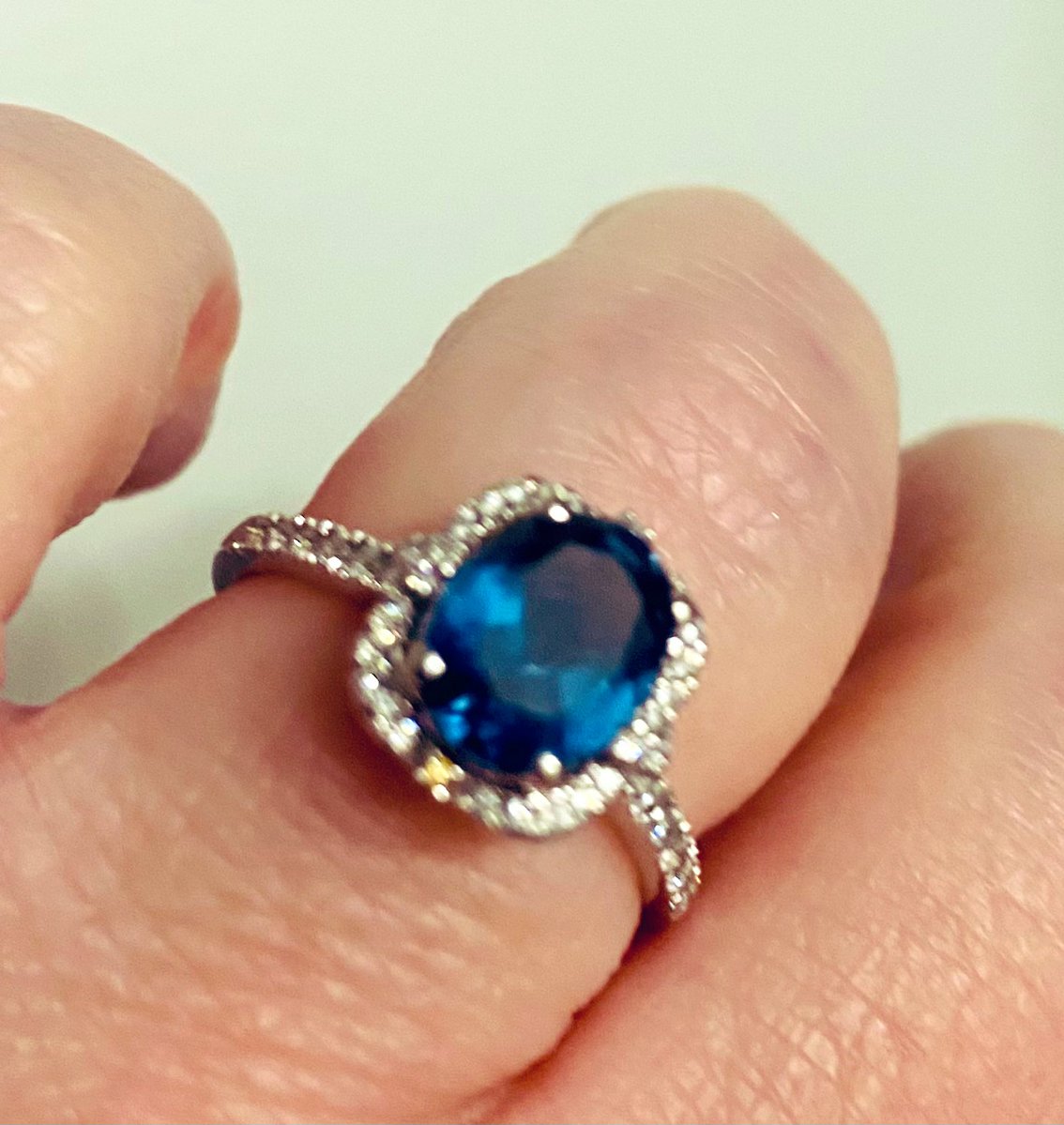 deaflibertarian's tweet image. It&apos;s hard to photograph the color but it&apos;s actually a much brighter blue than I can capture on my phone. Blue Topaz! Diamond accents.