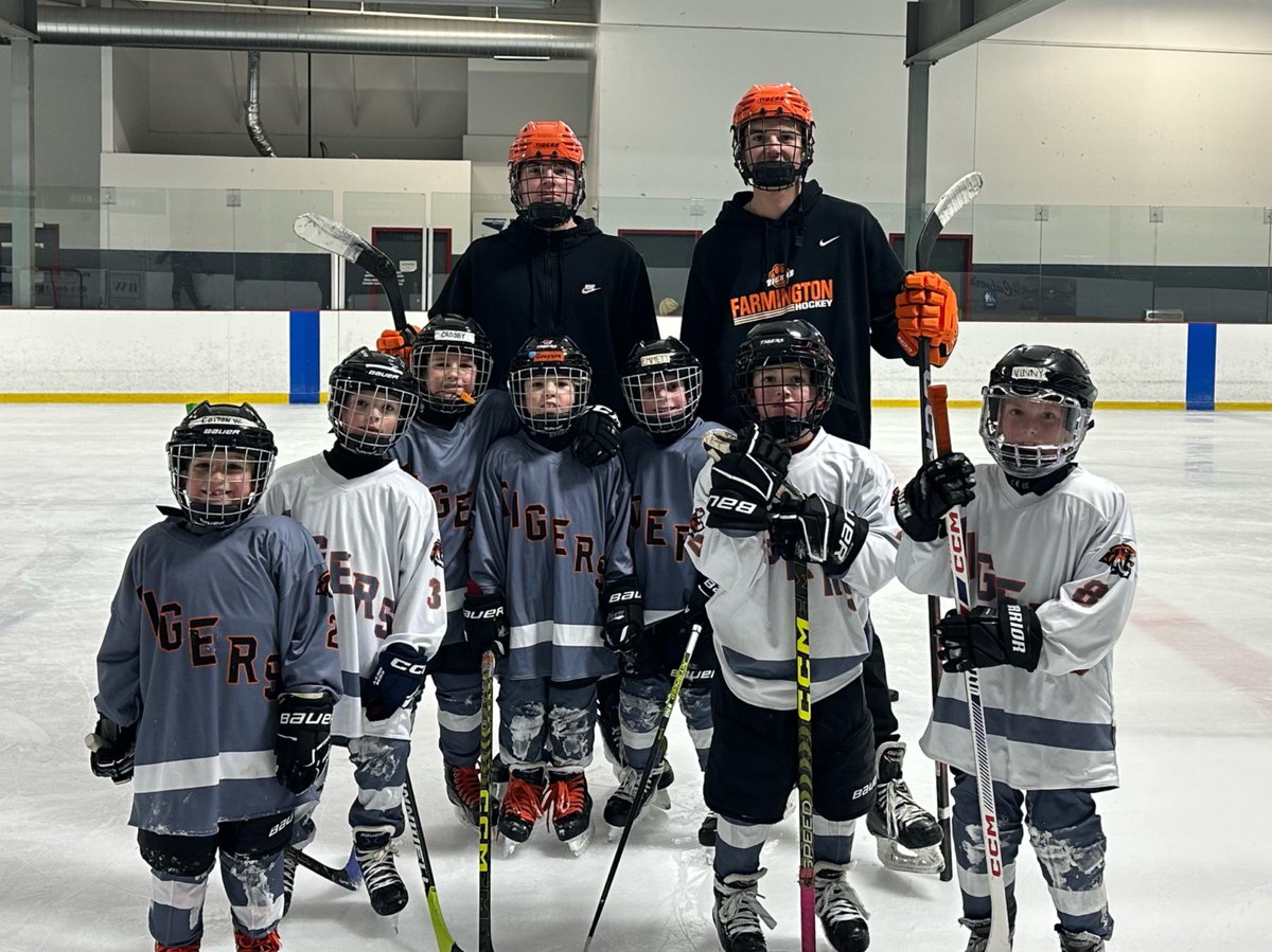 FHS__hockey's tweet photo. The Mite 1 Gray Team had some extra fun at practice with two FHS Hockey Captains Jack Budde and Tanner Gylling! So much fun for both the big and little Tigers! 
#tigerpride #futurecaptains https://t.co/xSwyASOI4b