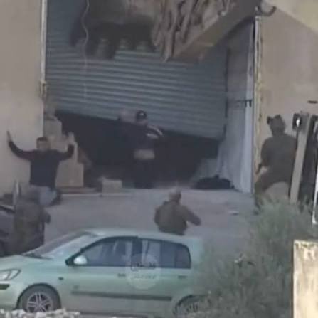 They were surrendering. 

Their hands were up and they killed them anyway. 

Barbaric monsters.