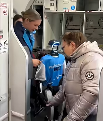 SciTechDaily01's tweet image. Russian airline Pobeda made history as the world’s first airline to trial a #humanoidrobot flight attendant.
Named “Volodya,” the Unitree robot served passengers on the Ulyanovsk–Moscow route.