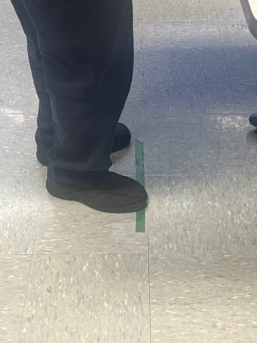 I was shooting in a basketball tournament at work. 
This is a picture of a guys foot that beat me, is his foot over the line?
Should he be disqualified?
*i shot after him and beat him, just wondering what yall think.
I think he is over the line.